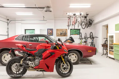 a front view of a car with garage