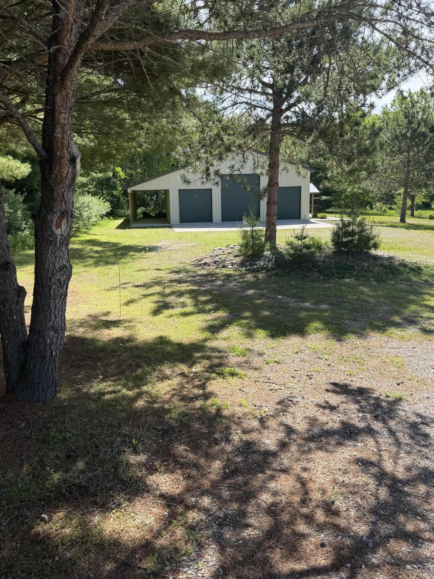 1595 South Poor Farm Road Mikado, MI 48745 - Photo 6 of 78 1595 back yard