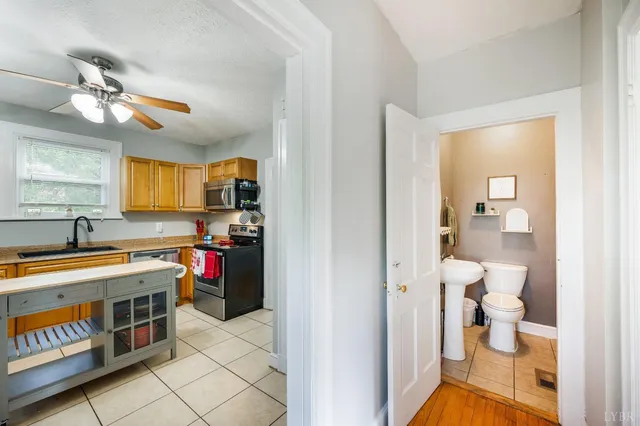 a very nice looking kitchen with a large window