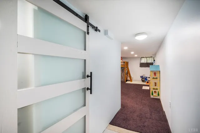 a view of a hallway view with staircase