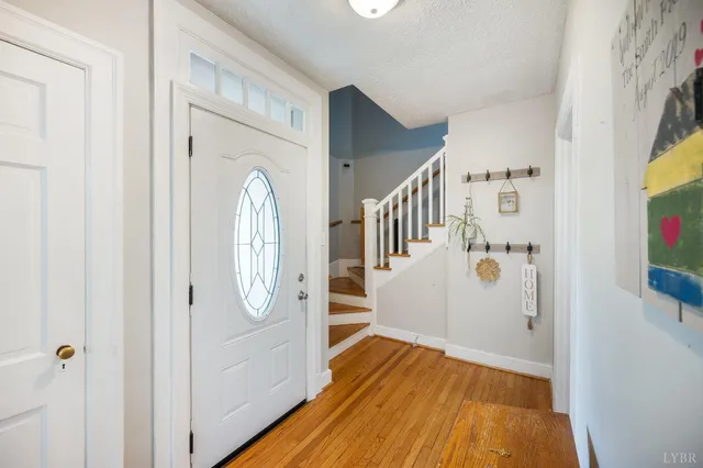 a view of entryway with wooden floor