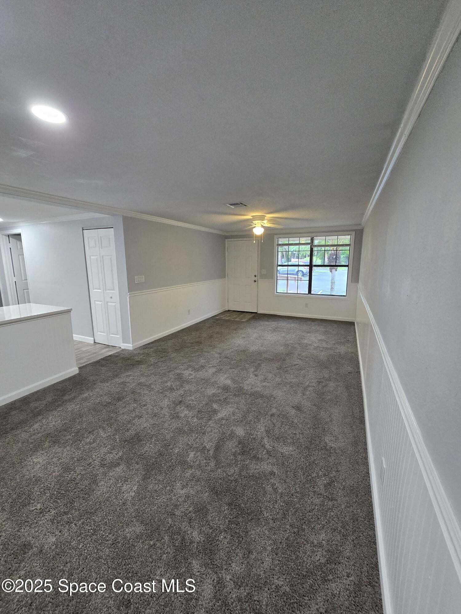 1700 Bottlebrush Drive, Unit 101 Palm Bay, FL 32905 - Photo 5 of 14 Living Room