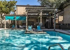 a view of a chairs and tables in patio