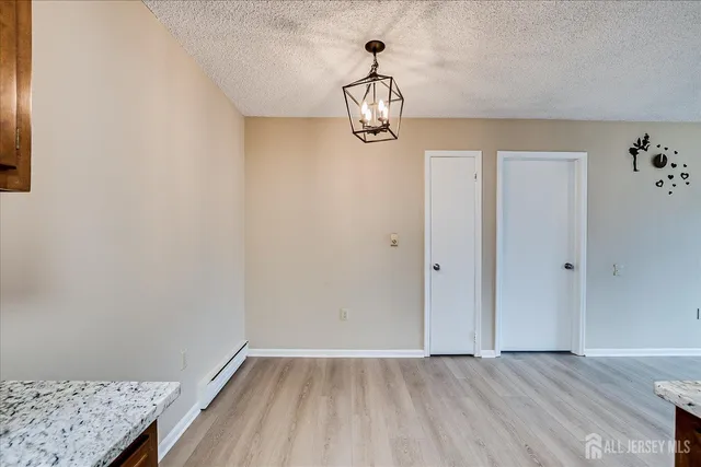 a view of small space with wooden floor