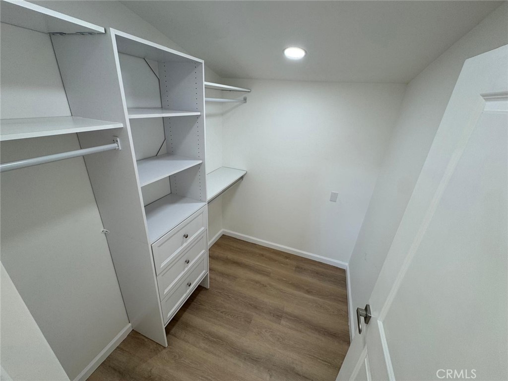 5276 Almar Street Riverside, CA 92505 - Photo 11 of 13 a view of walk in closet with empty racks