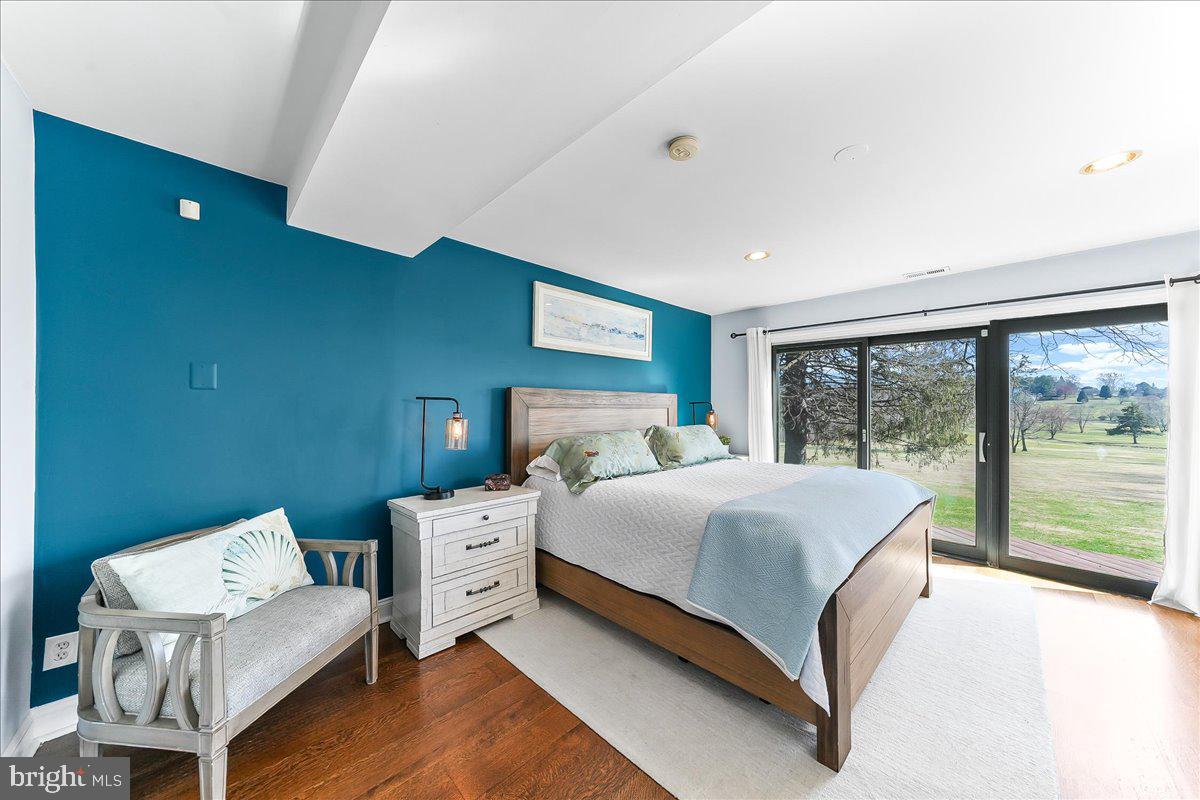 1056 Lenape Road West Chester, PA 19382 - Photo 21 of 48 a bedroom with a bed and a large window
