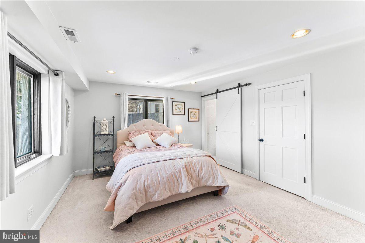 1056 Lenape Road West Chester, PA 19382 - Photo 28 of 48 a bedroom with a bed and a window