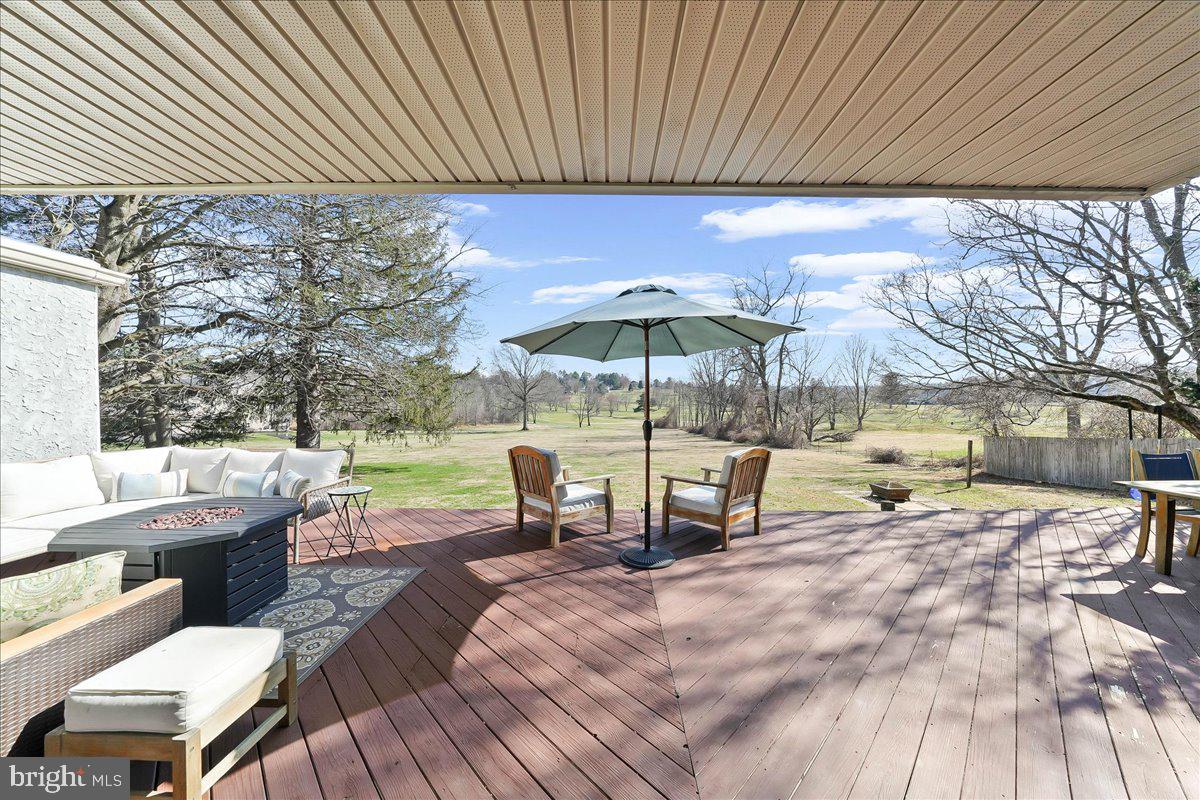 1056 Lenape Road West Chester, PA 19382 - Photo 31 of 48 a view of a patio with a table chairs and a barbeque