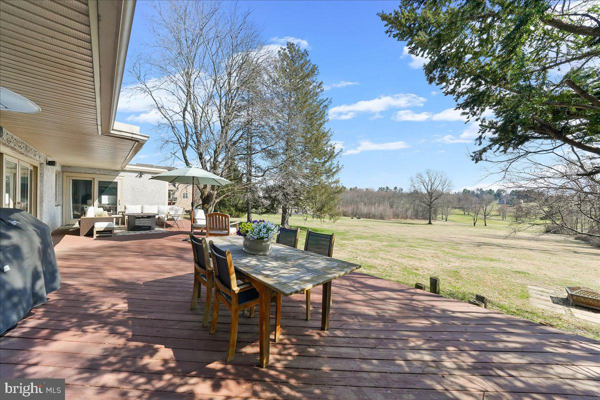 1056 Lenape Road West Chester, PA 19382 - Photo 33 of 48 a swimming pool view with a outdoor seating