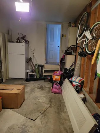 a storage room with washer and dryer