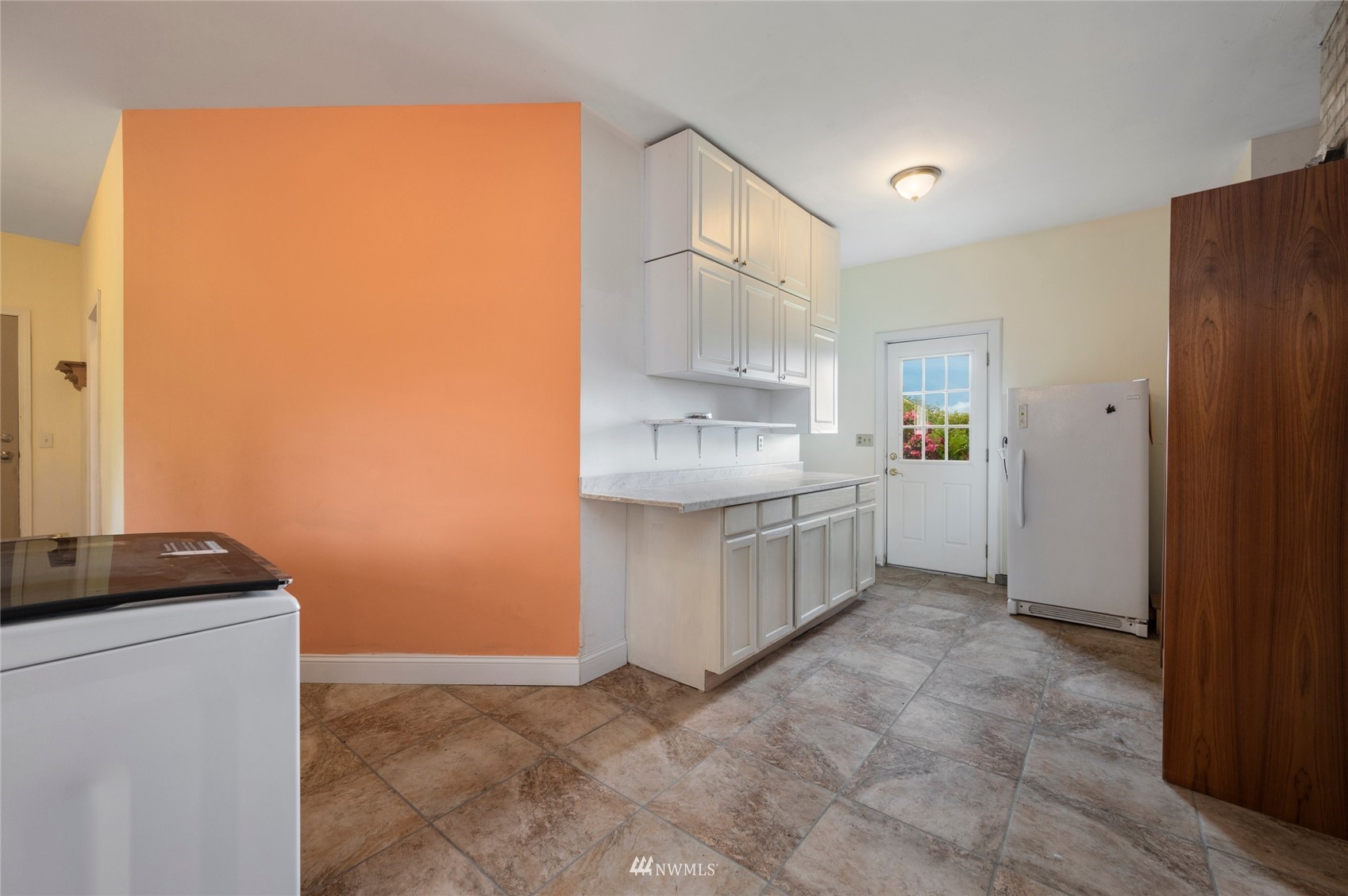 208 Reeds Lane Everson, WA 98247 - Photo 27 of 36 a kitchen with white cabinets and a sink