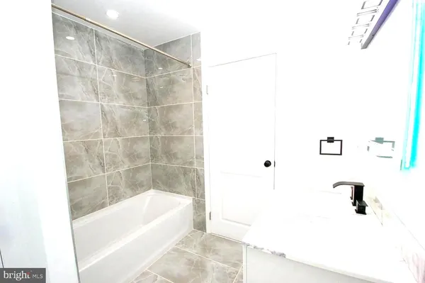 a bathroom with a bathtub