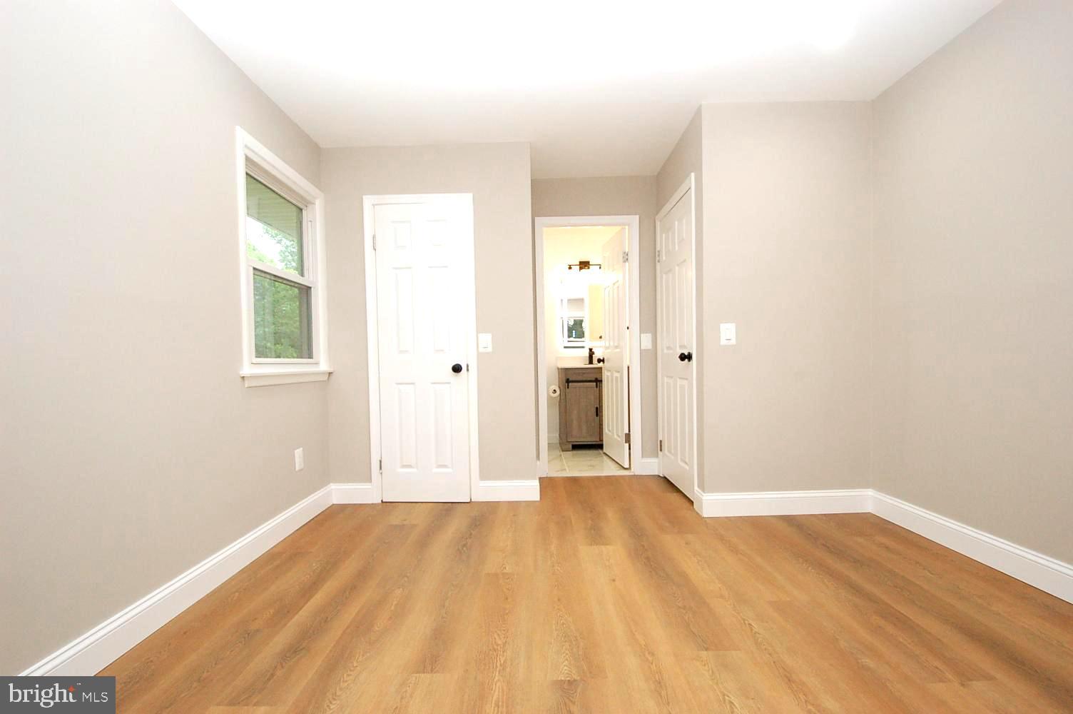 780 Stinchcomb Road Severna Park, MD 21146 - Photo 24 of 58 a view of a livingroom with wooden floor