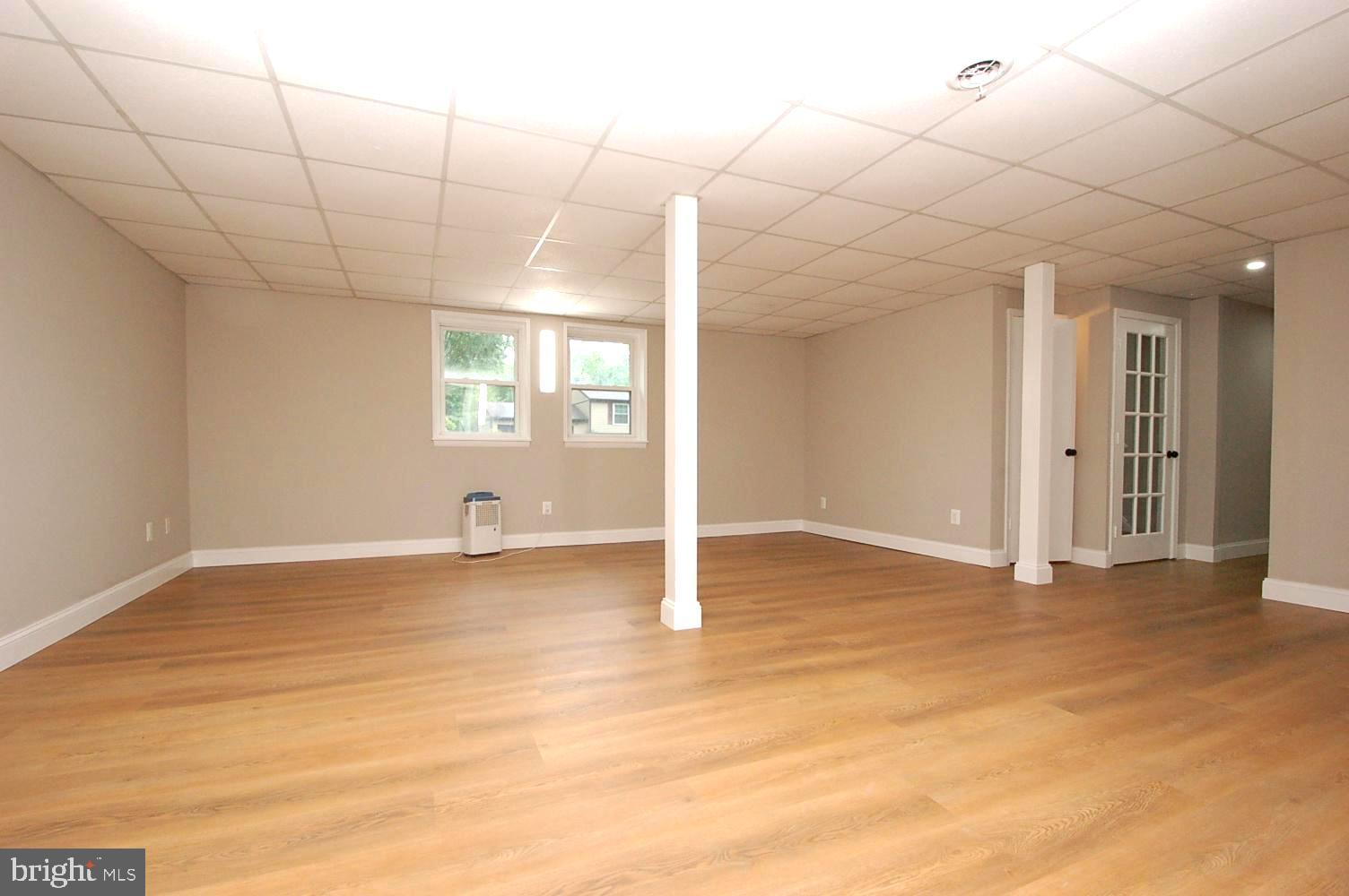 780 Stinchcomb Road Severna Park, MD 21146 - Photo 40 of 58 an empty room with windows