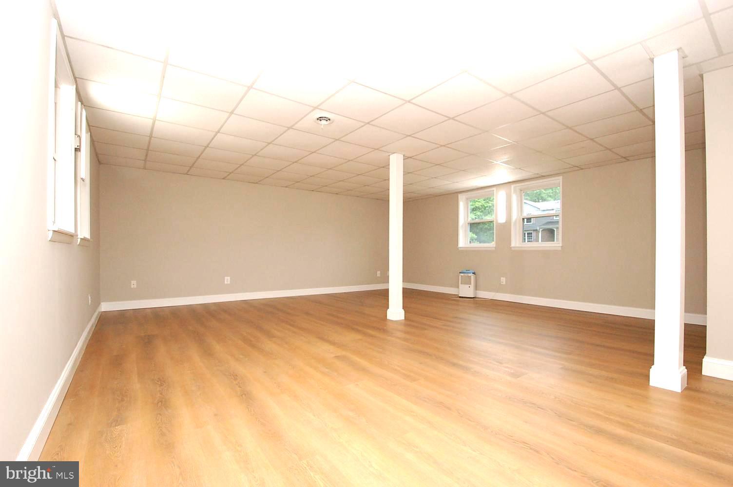 780 Stinchcomb Road Severna Park, MD 21146 - Photo 41 of 58 a view of an empty room with windows