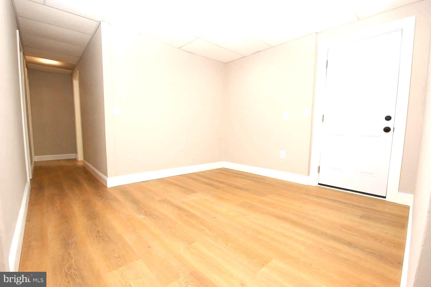 780 Stinchcomb Road Severna Park, MD 21146 - Photo 42 of 58 a view of empty room with wooden floor