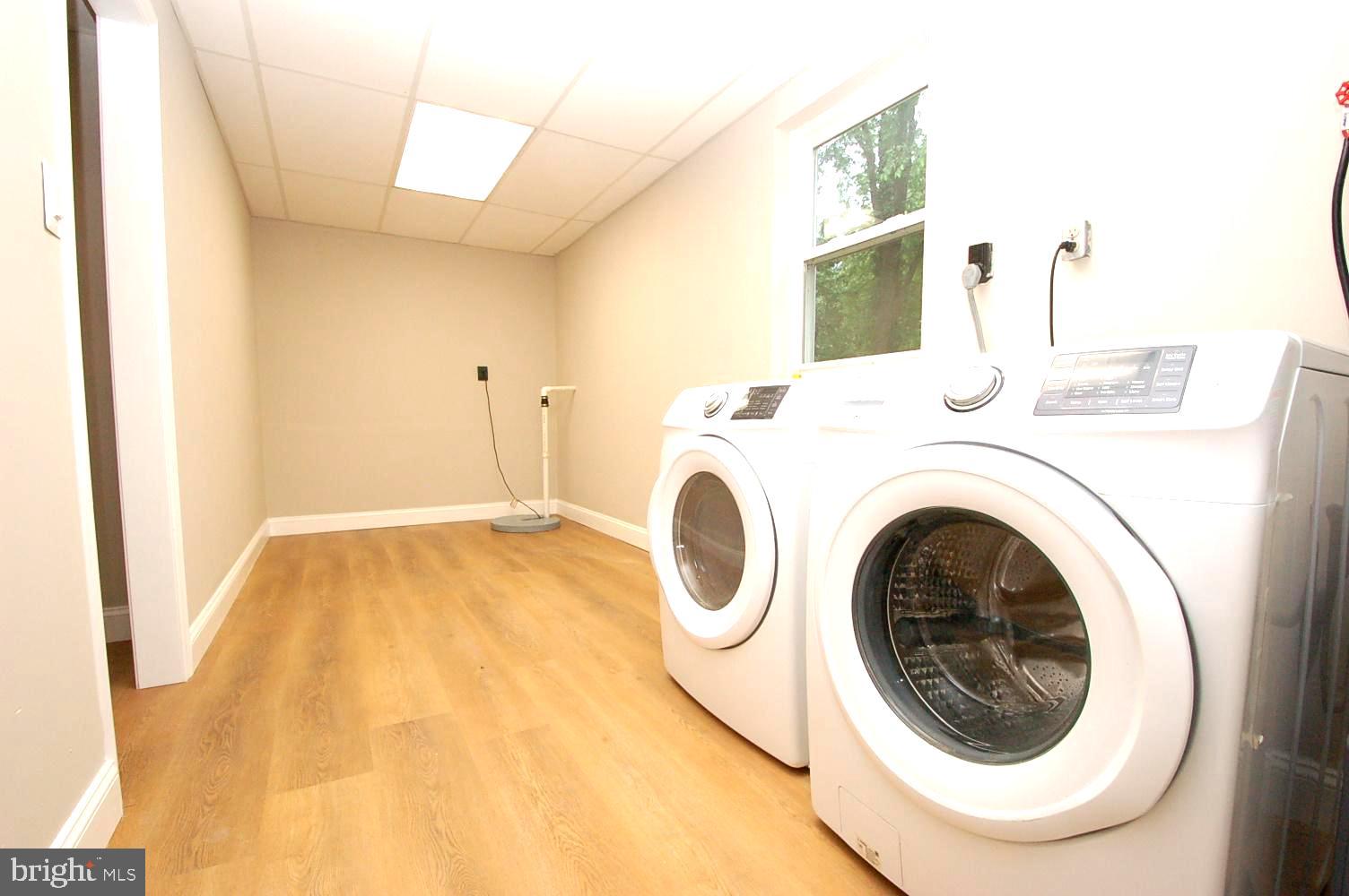 780 Stinchcomb Road Severna Park, MD 21146 - Photo 43 of 58 a utility room with dryer and washer
