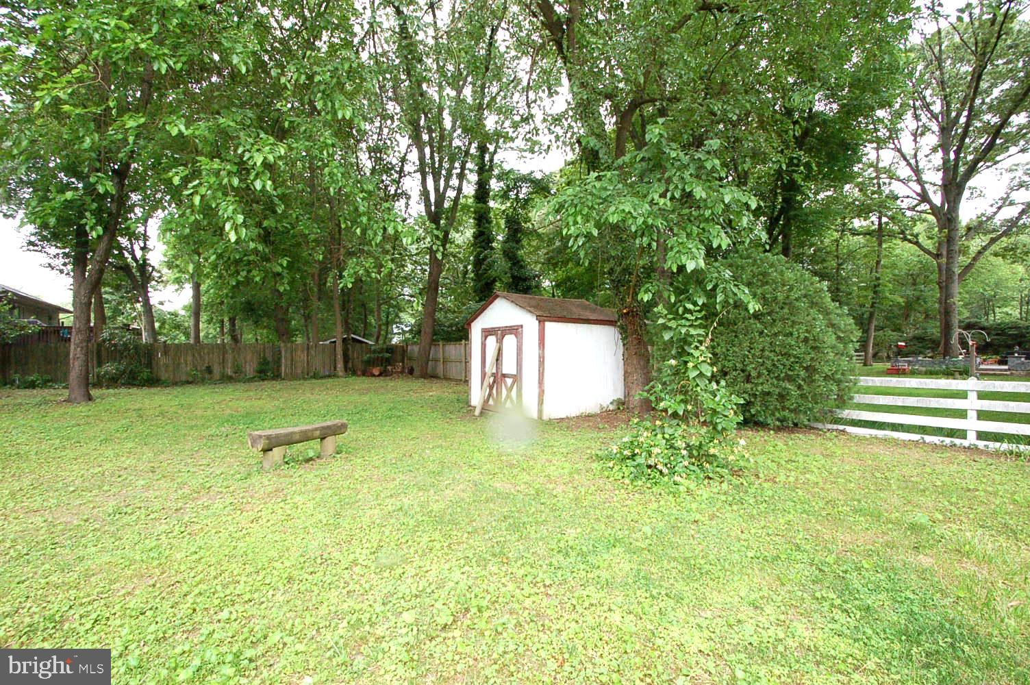 780 Stinchcomb Road Severna Park, MD 21146 - Photo 50 of 58 a backyard of a house with lots of green space