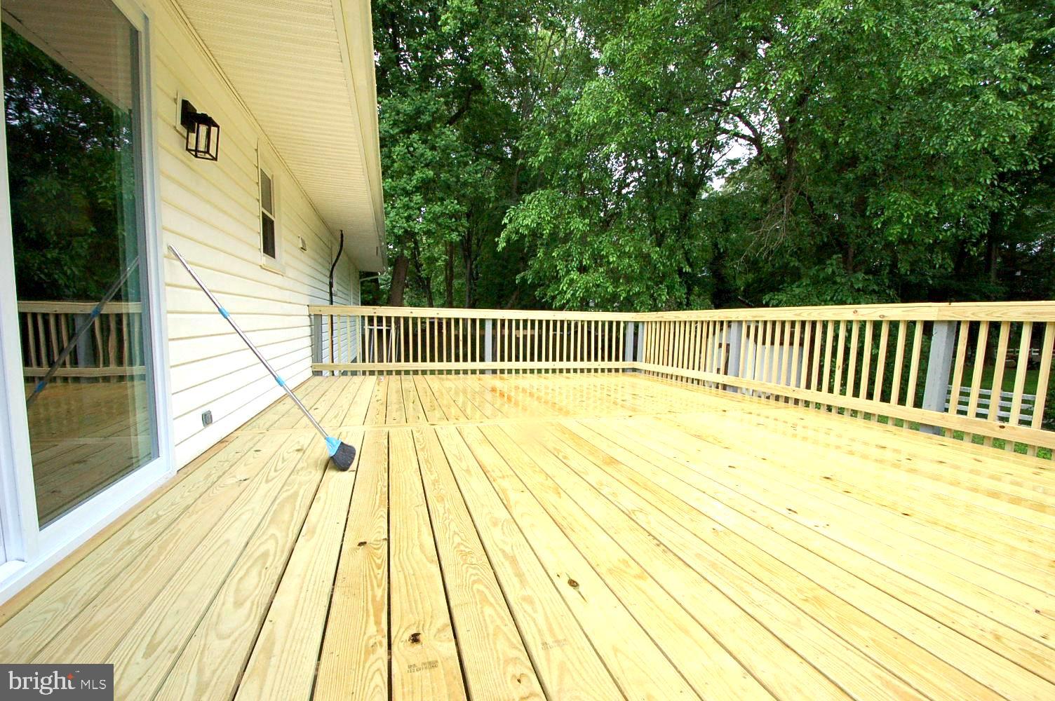 780 Stinchcomb Road Severna Park, MD 21146 - Photo 52 of 58 a view of balcony with wooden floor and fence