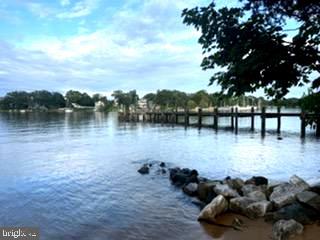 780 Stinchcomb Road Severna Park, MD 21146 - Photo 54 of 58 a view of a lake with outdoor space