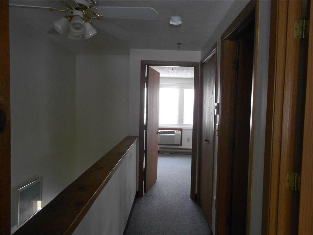 1373 Post Road, Unit 100C Wells, ME 04090 - Photo 12 of 25 Upper hallway landing to sun filled ...