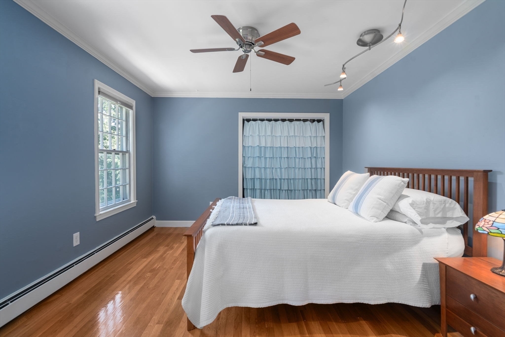 24 Russett Hill Road Sherborn, MA 01770 - Photo 25 of 39 a bedroom with a bed and window