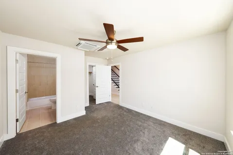 a view of balcony with wooden floor
