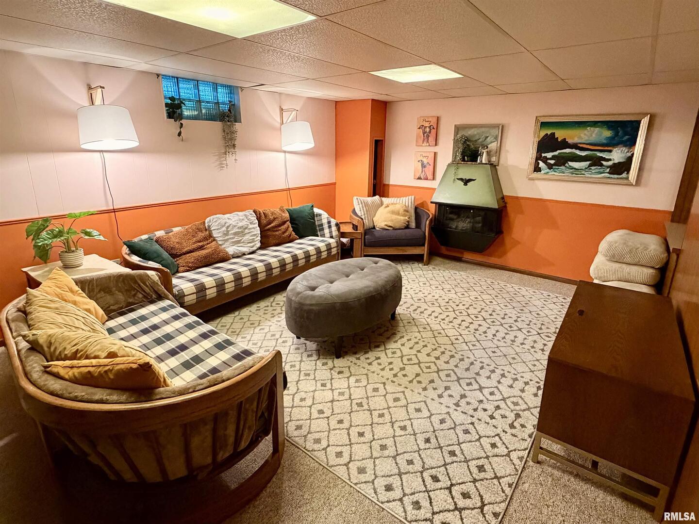 1043 14th Avenue South Clinton, IA 52732 - Photo 20 of 23 a living room with furniture and a rug