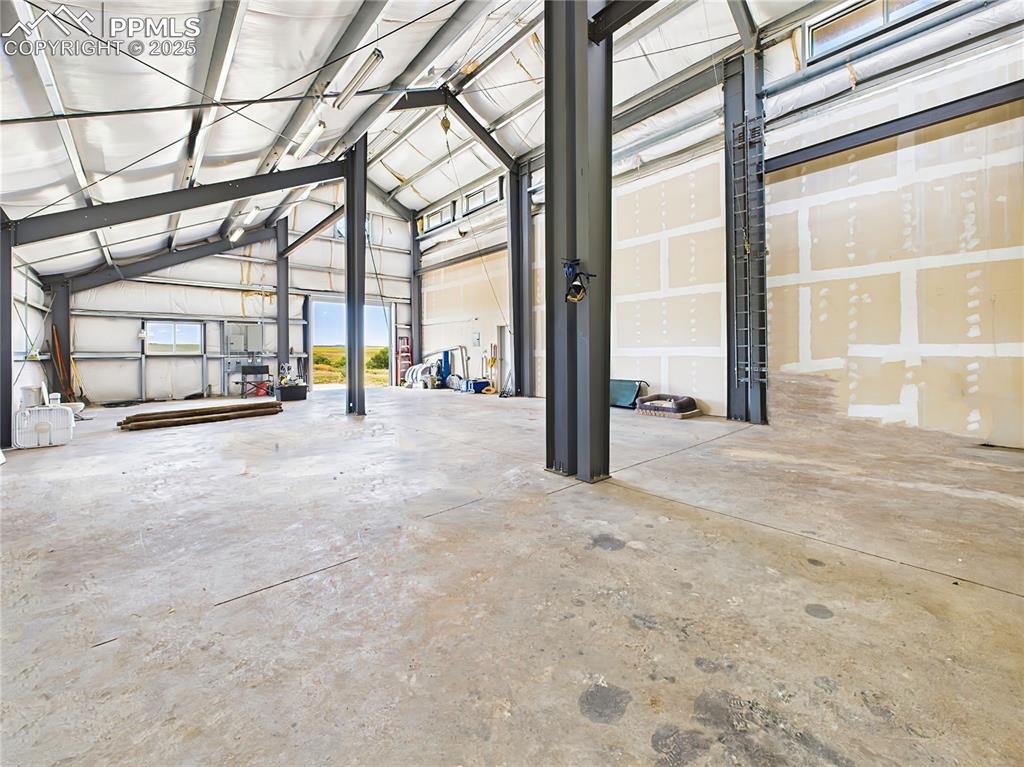 11834 Cave Spring Road Franktown, CO 80116 - Photo 14 of 50 a view of a hall with a street