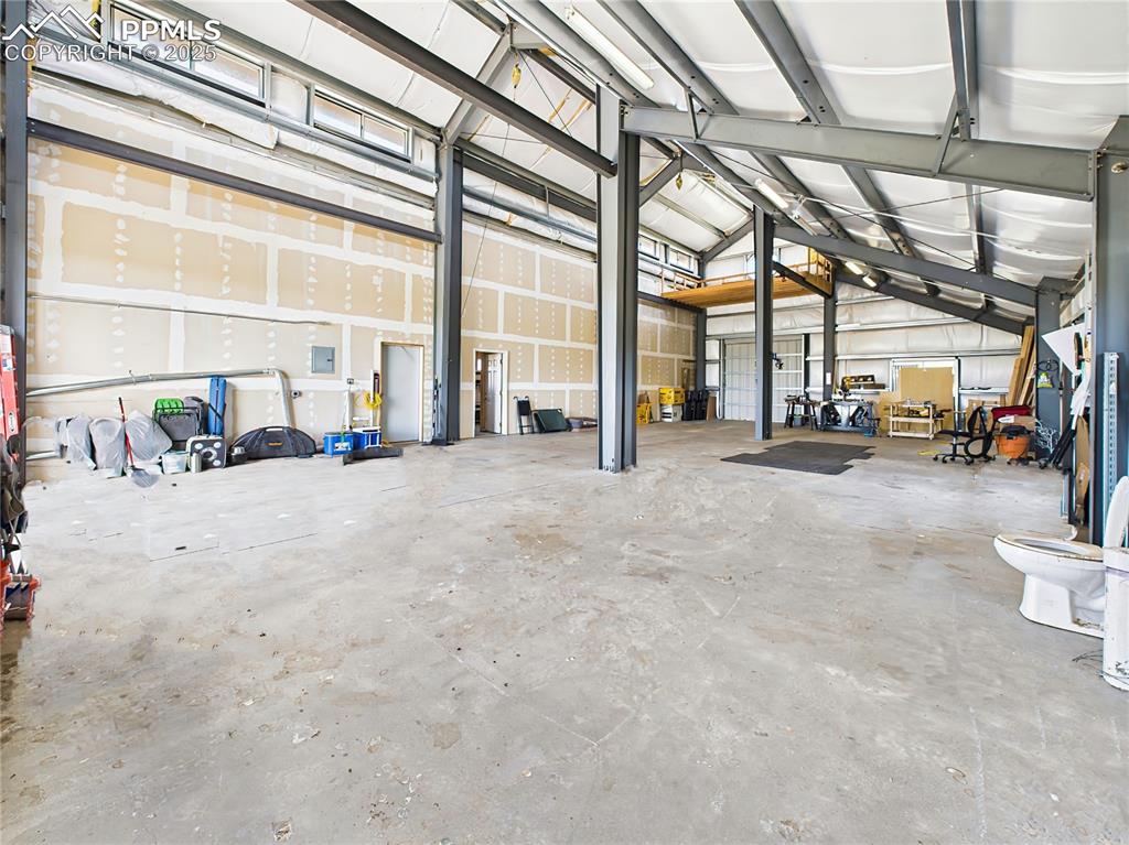 11834 Cave Spring Road Franktown, CO 80116 - Photo 9 of 50 a view of a building with car parked