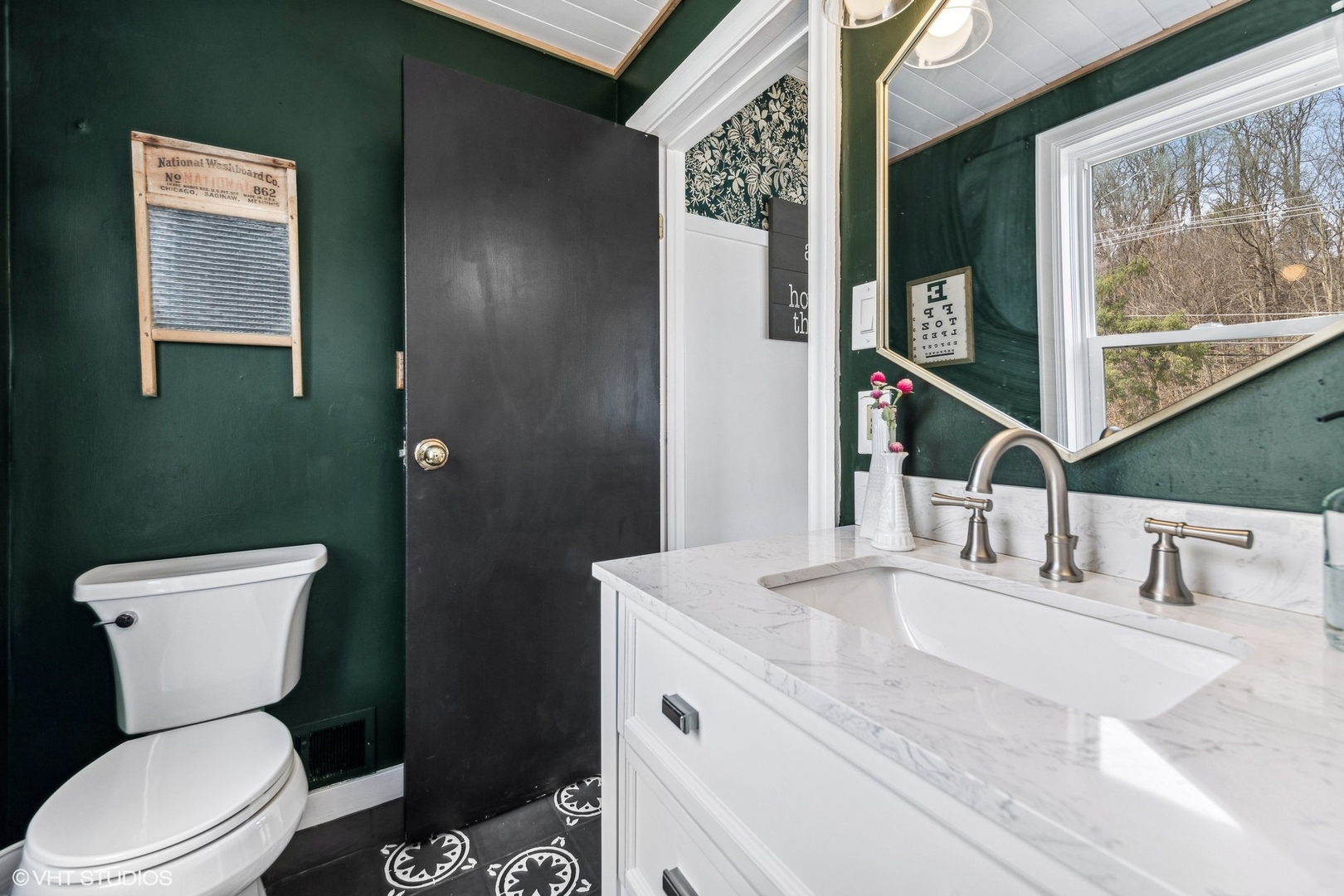 705 Spring Beach Way Cary, IL 60013 - Photo 14 of 47 a bathroom with a toilet sink and mirror