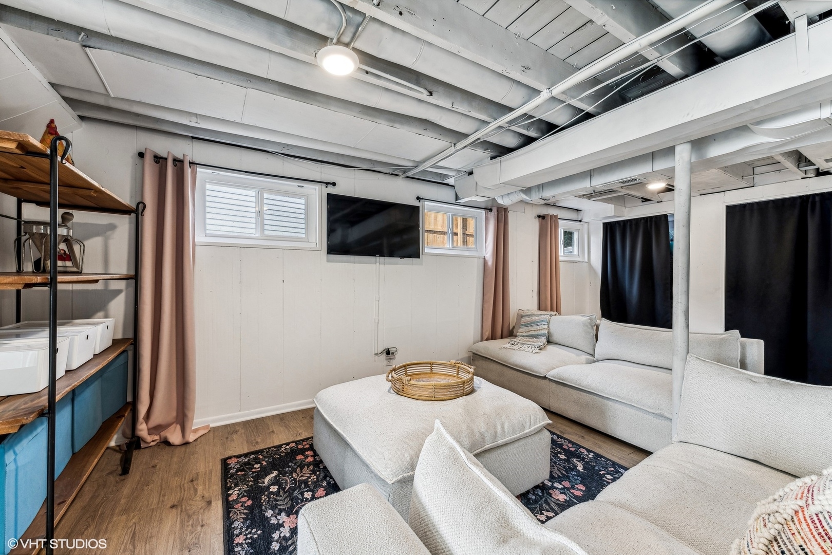 705 Spring Beach Way Cary, IL 60013 - Photo 21 of 47 a living room with furniture and a flat screen tv