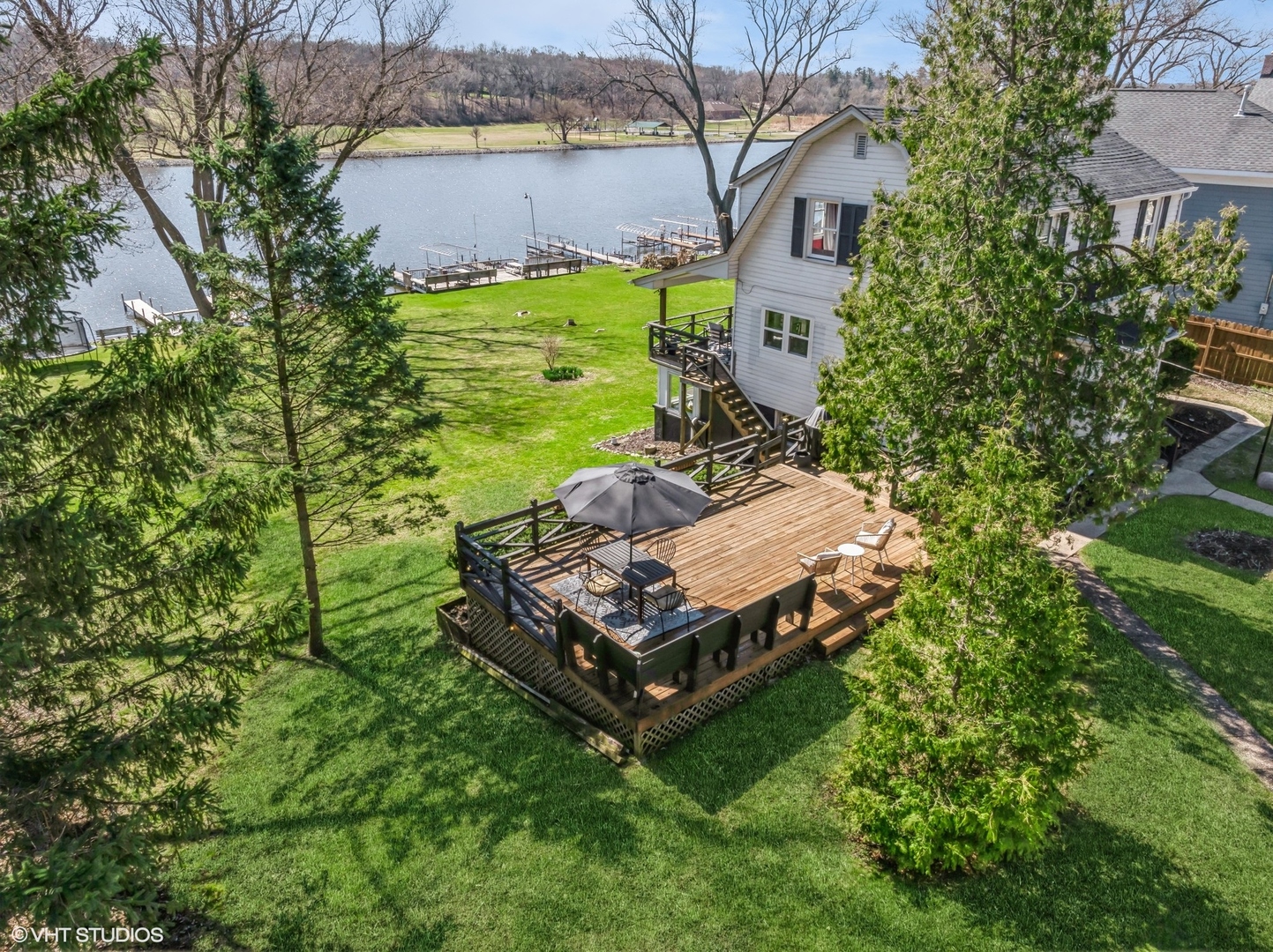 705 Spring Beach Way Cary, IL 60013 - Photo 28 of 47 a view of a backyard with plants