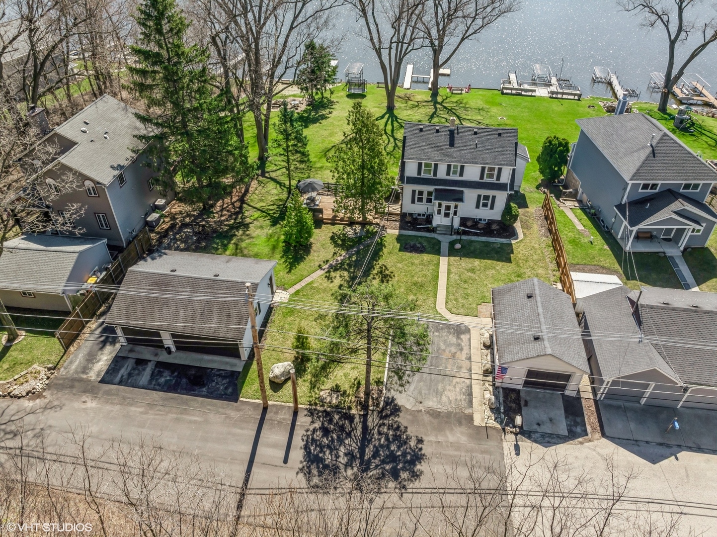 705 Spring Beach Way Cary, IL 60013 - Photo 31 of 47 an aerial view of a houses with yard