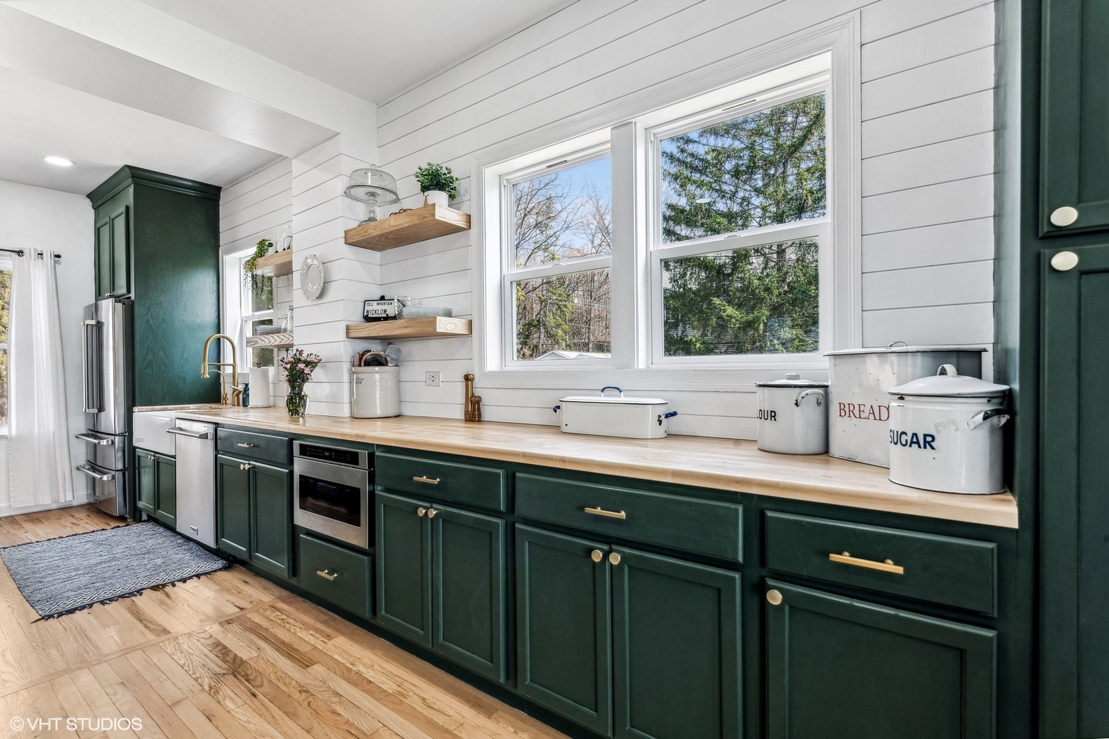 705 Spring Beach Way Cary, IL 60013 - Photo 9 of 47 a kitchen with a sink stove and cabinets