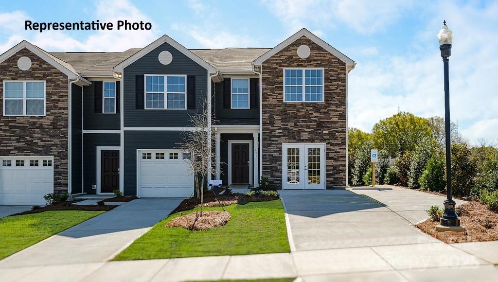 1314 Equestrian Lane York, SC 29745 - Photo 1 of 25 a front view of a house with a yard