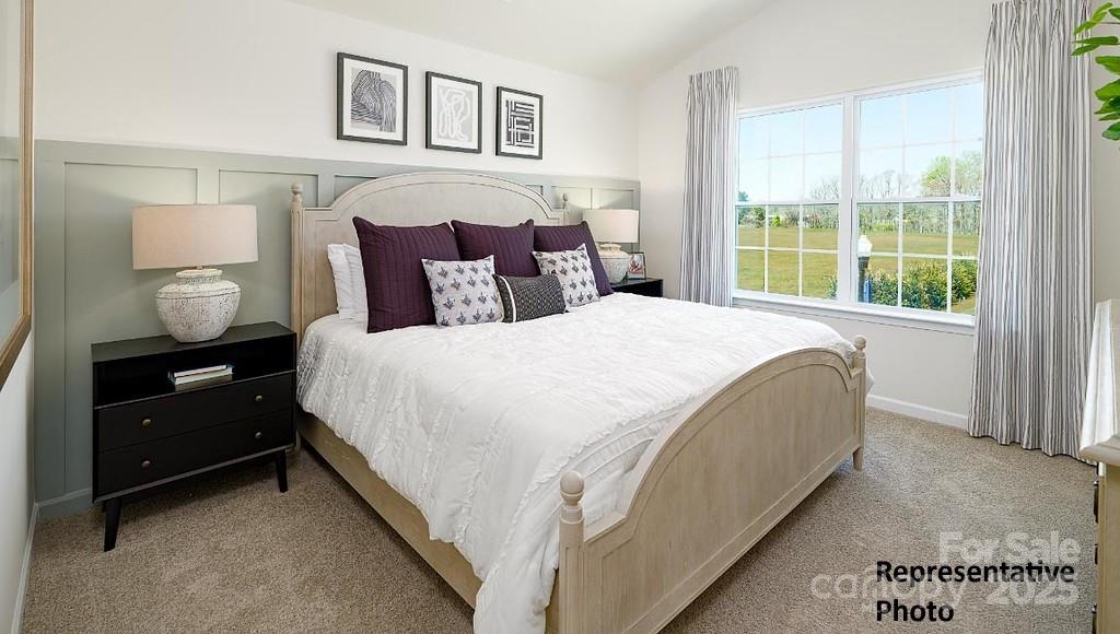 1314 Equestrian Lane York, SC 29745 - Photo 13 of 25 a spacious bedroom with a bed and window