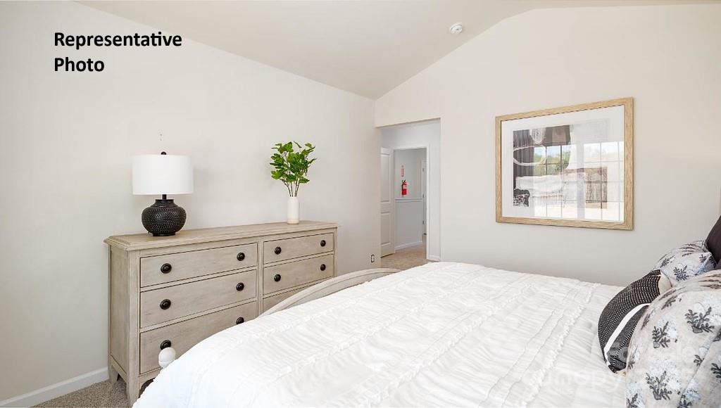 1314 Equestrian Lane York, SC 29745 - Photo 14 of 25 a bedroom with a bed and a dresser