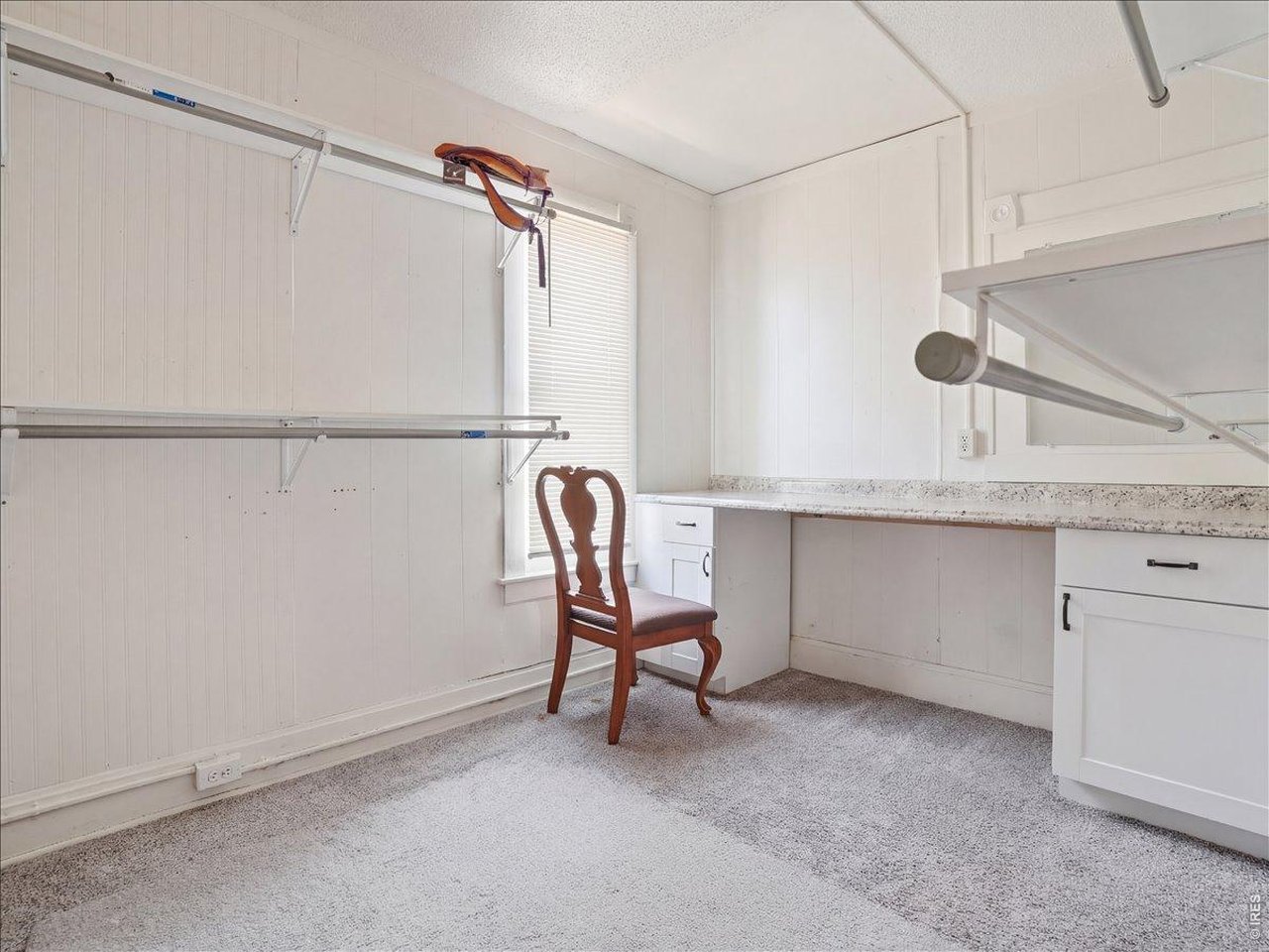 228 13th Street Greeley, CO 80631 - Photo 23 of 29 a view of a storage and utility room with furniture