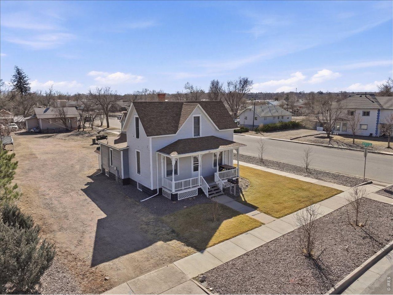 228 13th Street Greeley, CO 80631 - Photo 3 of 29 a view of a house with pool and chairs