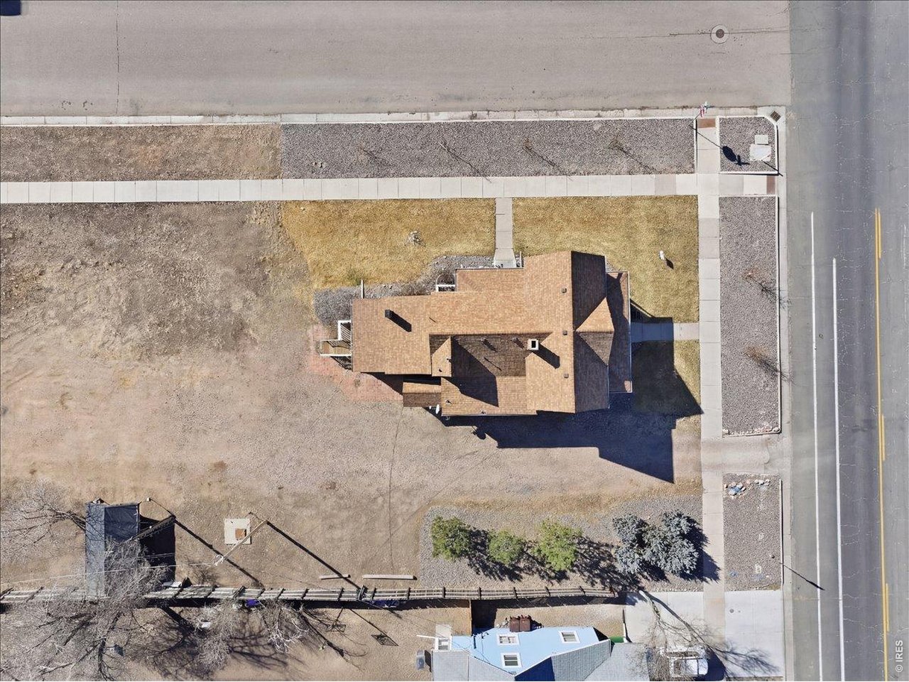 228 13th Street Greeley, CO 80631 - Photo 6 of 29 an aerial view of a balcony with chairs