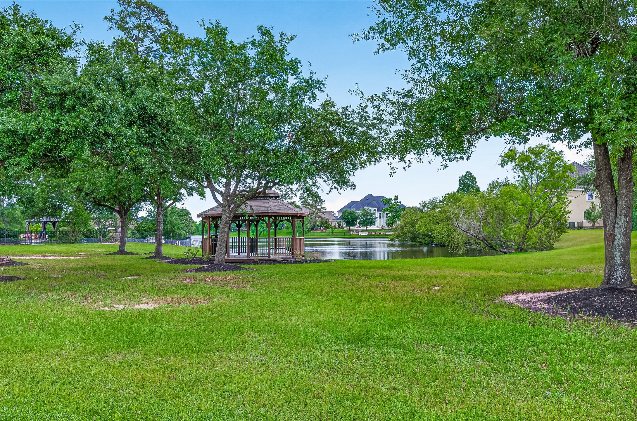 25626 Windy Isle Court Spring, TX 77389 - Photo 48 of 49 and a waterfront pavilion right across the home.