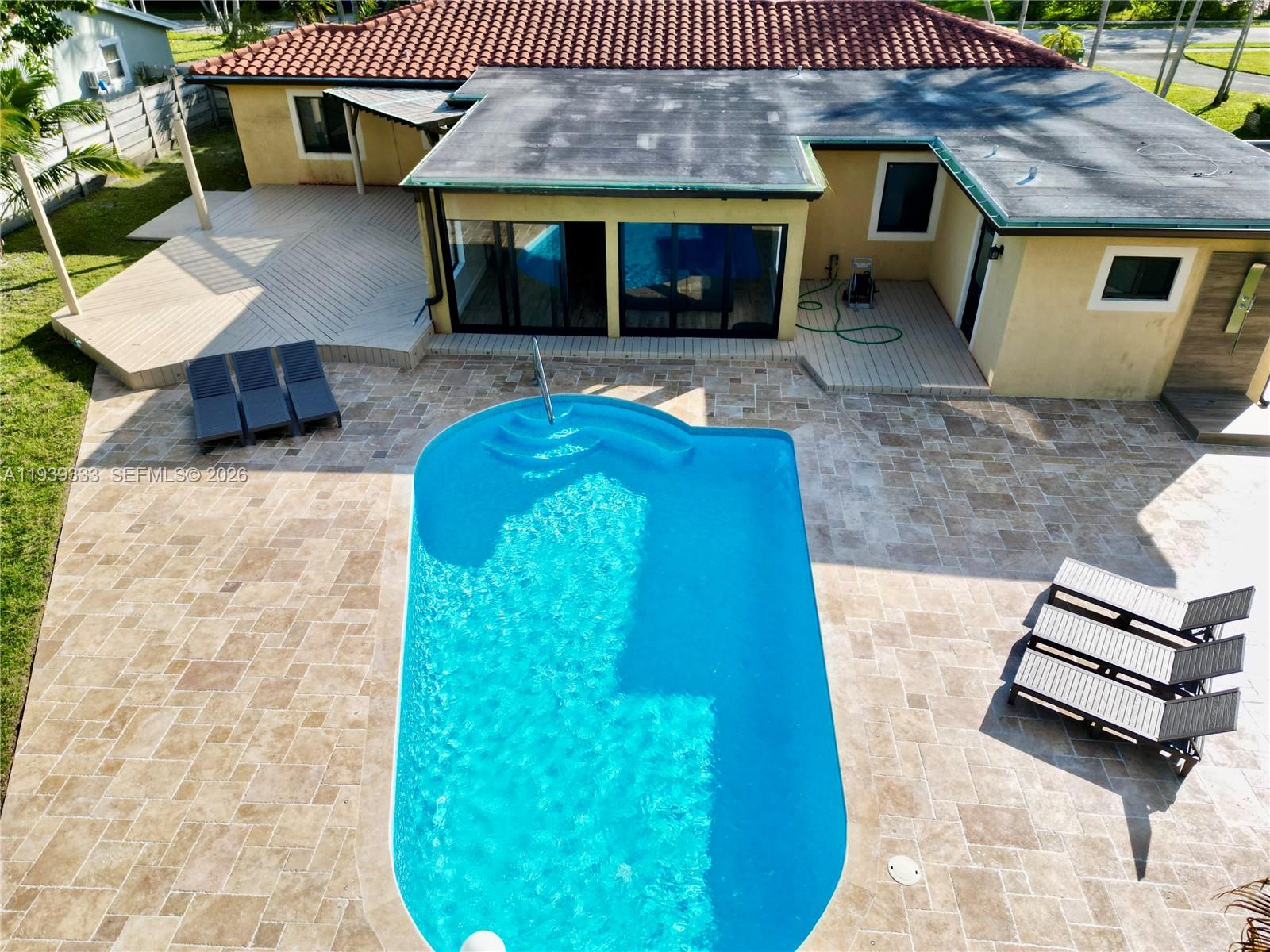 2639 Monroe Street Hollywood, FL 33020 - Photo 19 of 27 a front view of a house with a yard