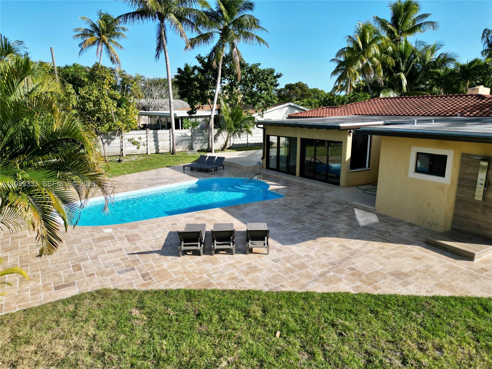 2639 Monroe Street Hollywood, FL 33020 - Photo 20 of 27 a front view of a house with garden