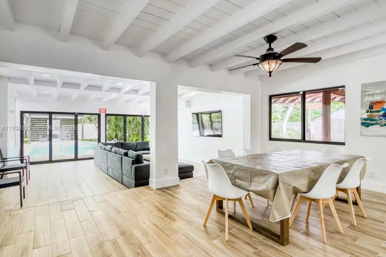 2639 Monroe Street Hollywood, FL 33020 - Photo 4 of 27 a view of a dining room with furniture window and outside view