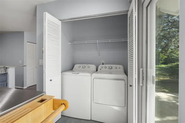 a utility room with dryer and washer