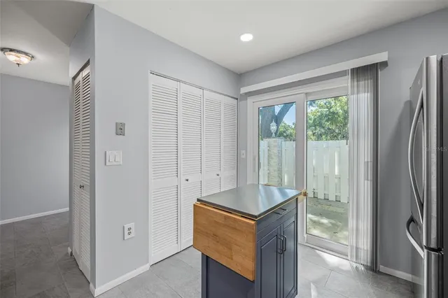 a view of cabinets and a kitchen