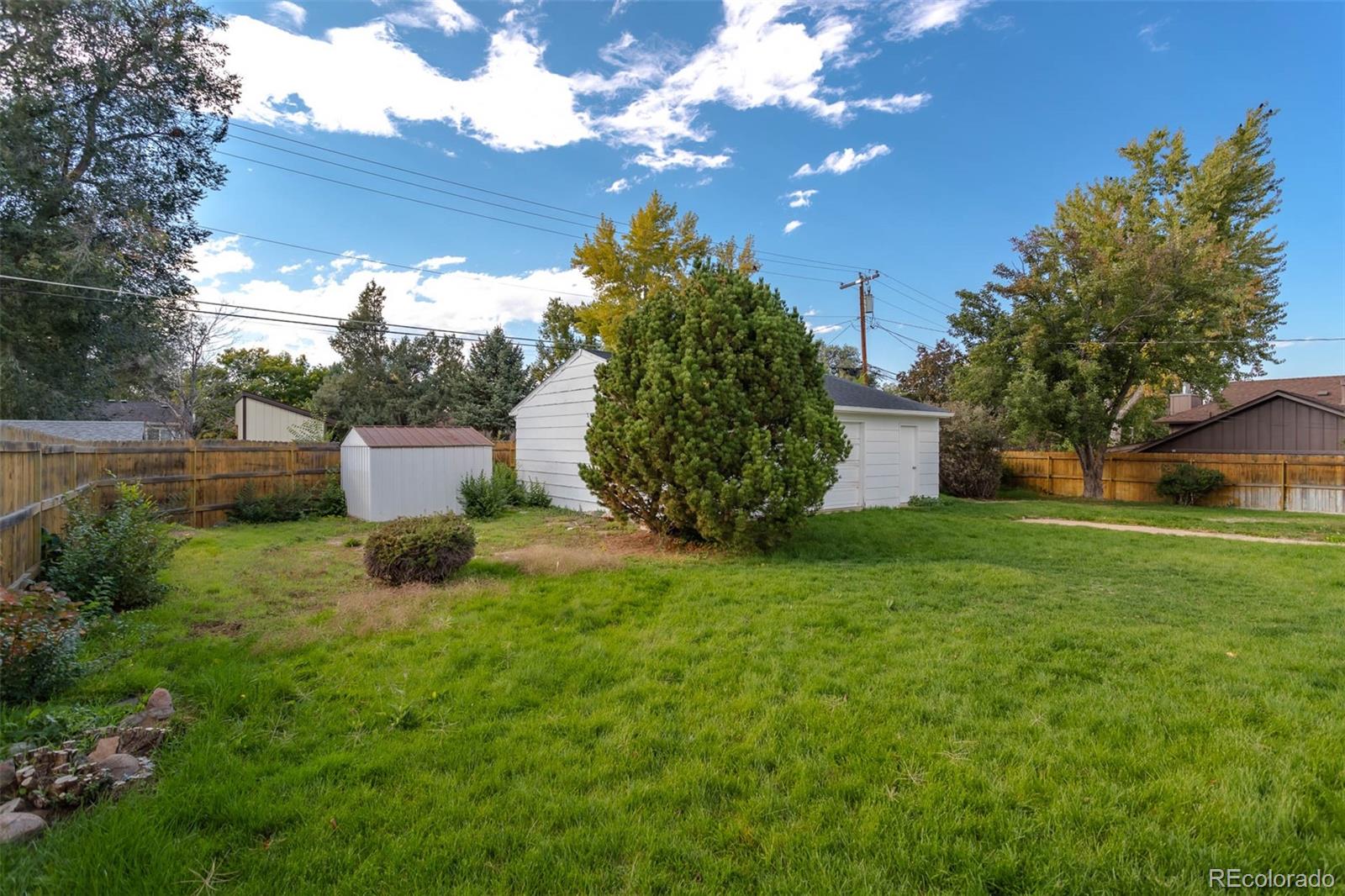 3075 South Emerson Way Englewood, CO 80113 - Photo 23 of 28 a house view with a garden space