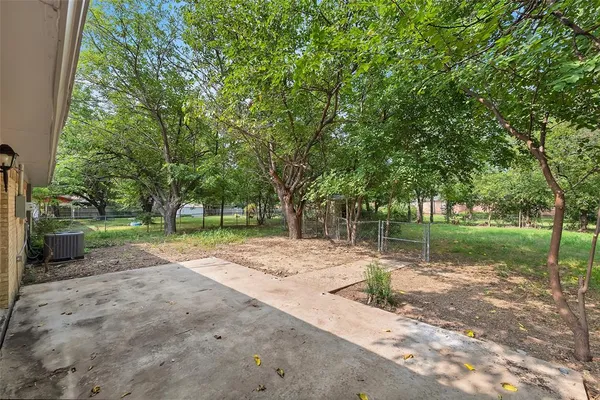a view of a park with tree s