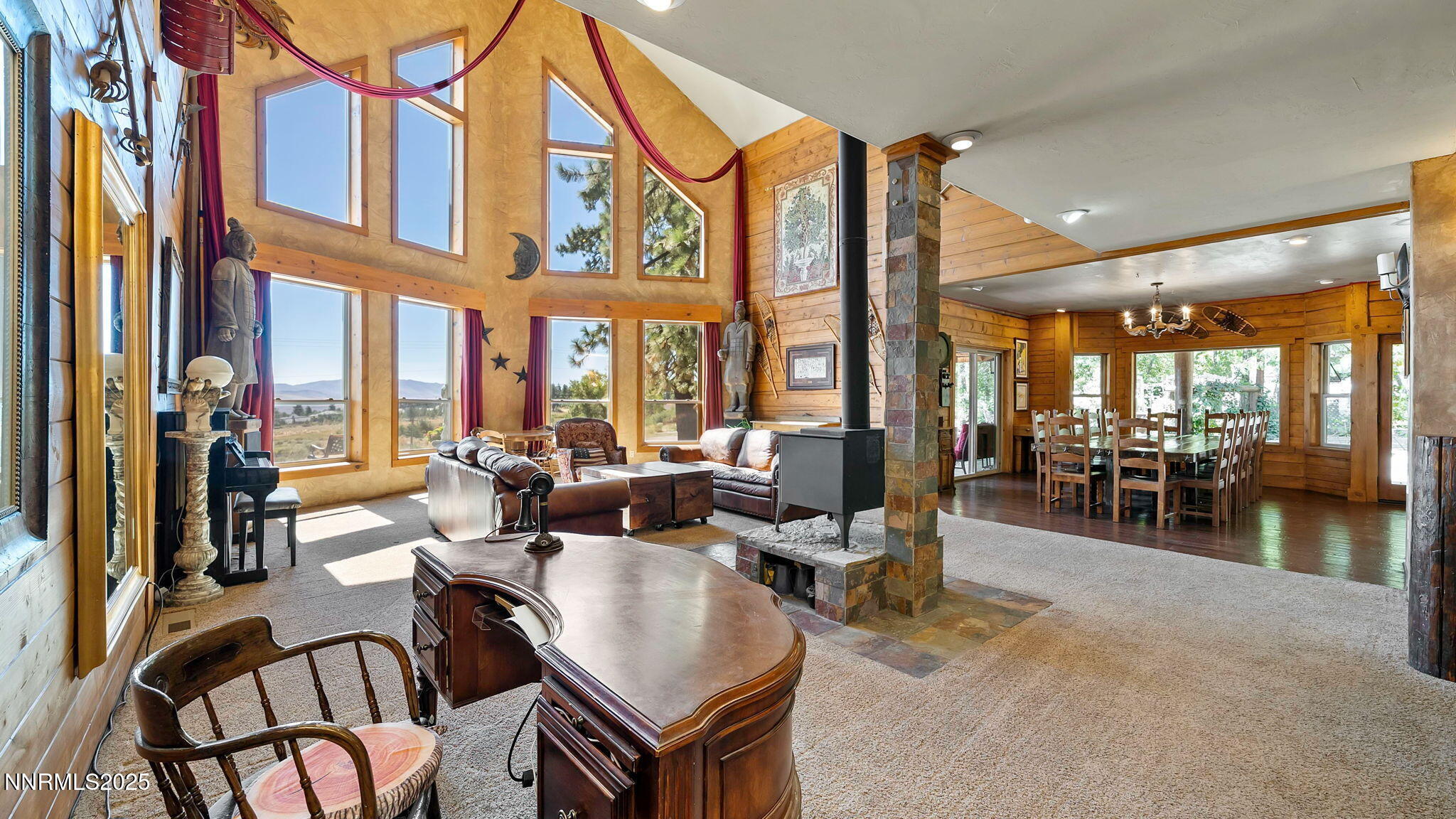 16700 Mt Rose Highway Reno, NV 89511 - Photo 17 of 50 a living room with fireplace furniture and a large window